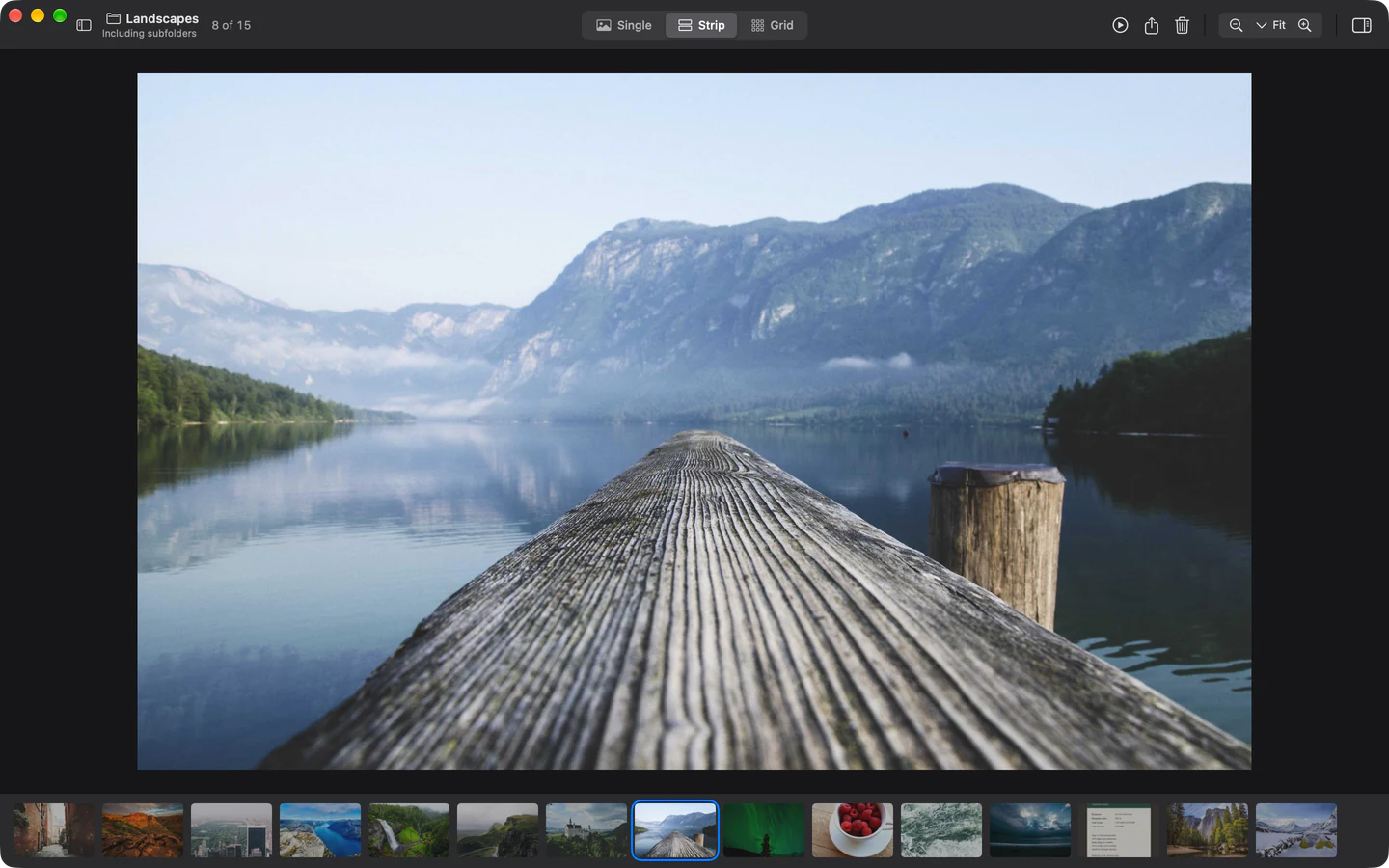 A lakeside dock in StillView’s Strip mode, with the collection’s images in a filmstrip below